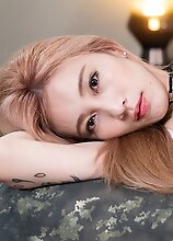 Slim Japanese tgirl Chulin Nakazawa shows herself in a nice white lingerie